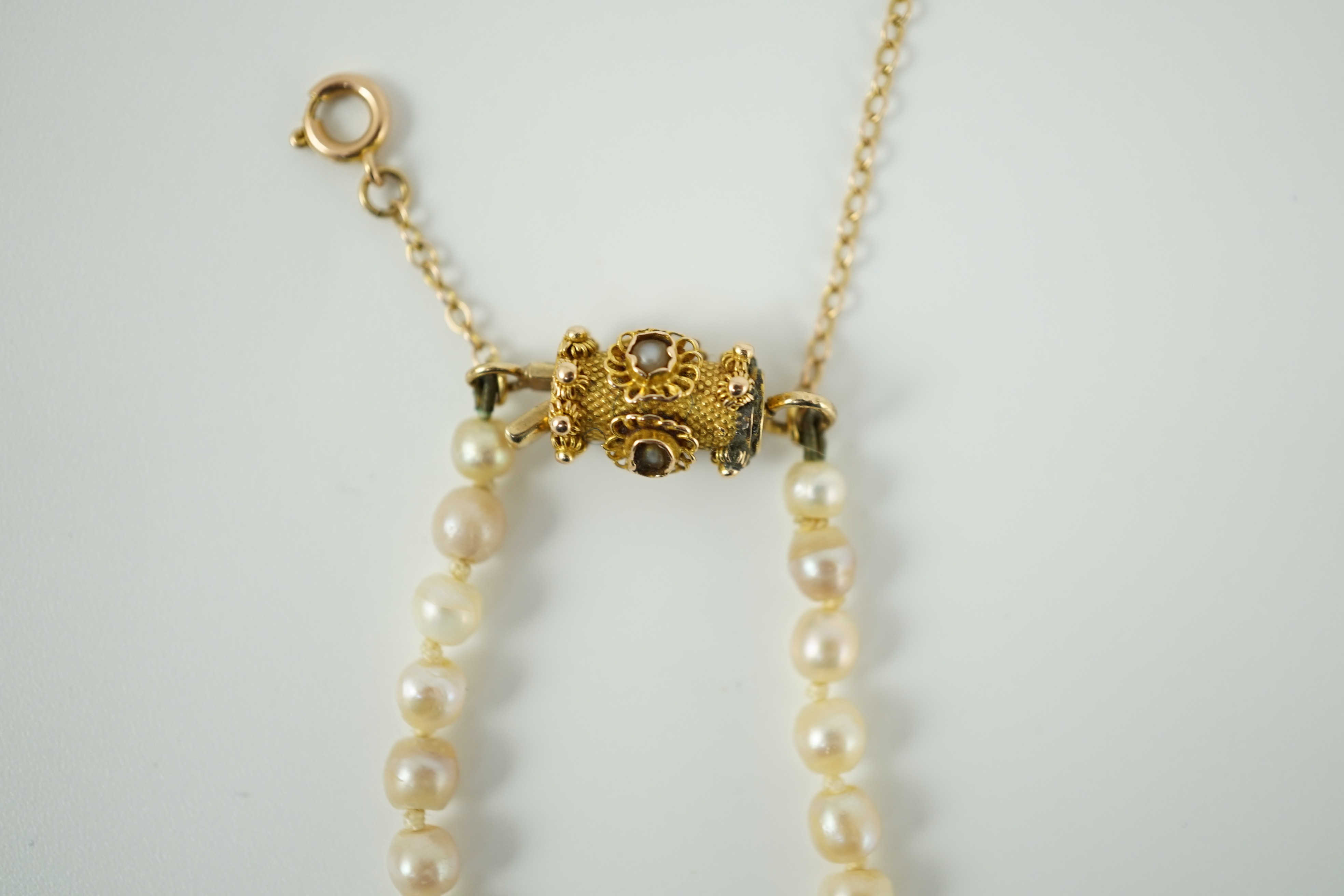 A single strand graduated natural saltwater pearl necklace